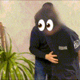 a man wearing a shirt that says abercrombie & fitch