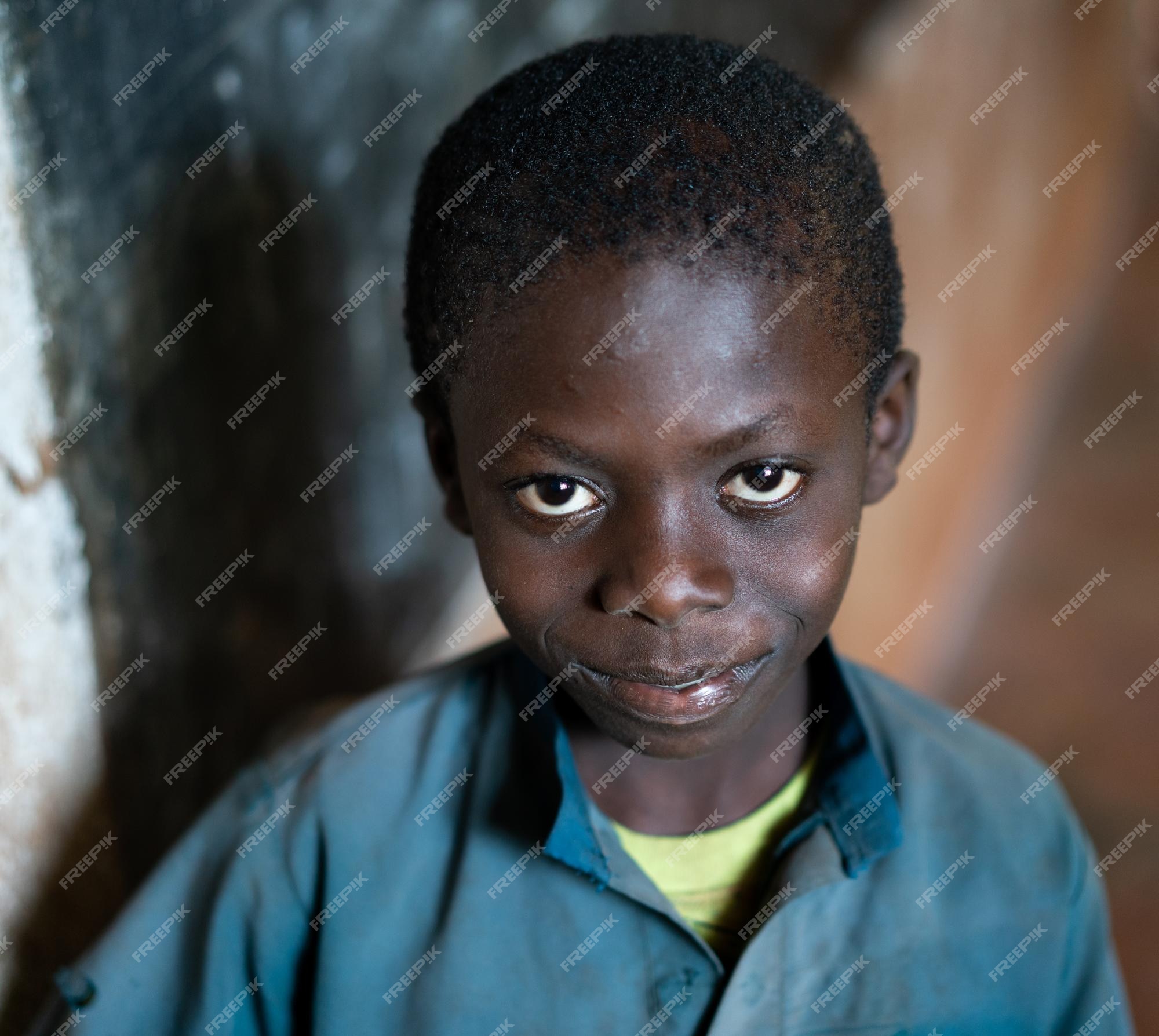 closeup-portrait-african-black-boy-portrait-inside-school-classroom-high-quality-photo_21730-14653.jpg