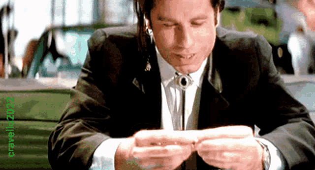 john-travolta-rolling-a-joint.gif