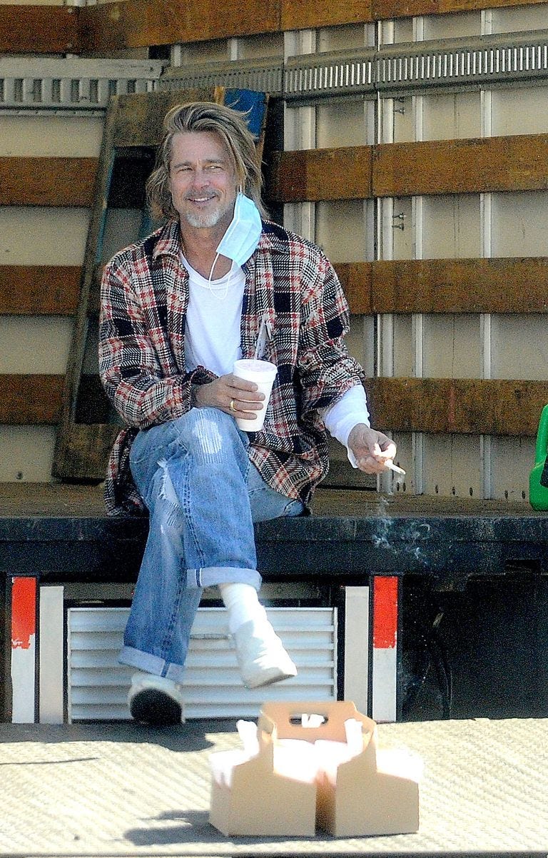 brad-pitt-volunteering-1605796892.jpg