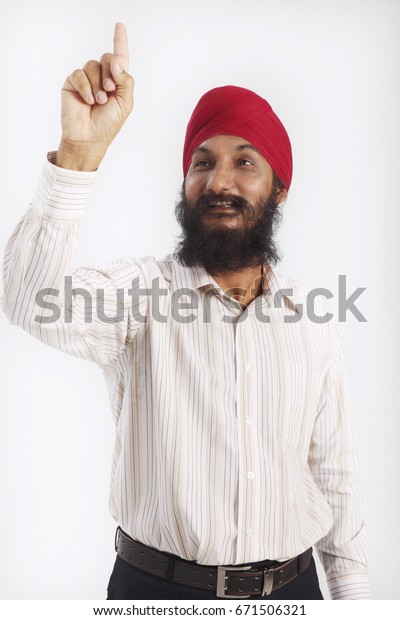 punjabi-man-showing-finger-600w-671506321.jpg