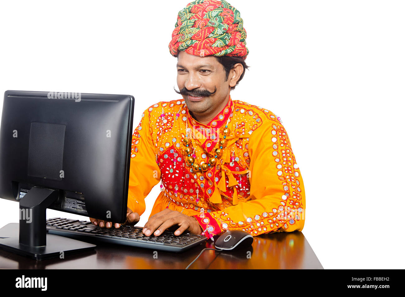 1-indian-rural-gujrati-man-computer-education-FBBEH2.jpg