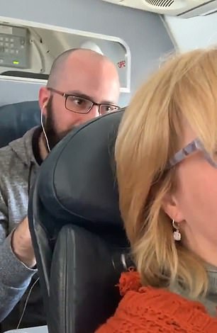 24650012-7995515-The_clip_was_filmed_on_a_flight_from_New_Orleans_to_Charlotte-a-48_1581514844912.jpg