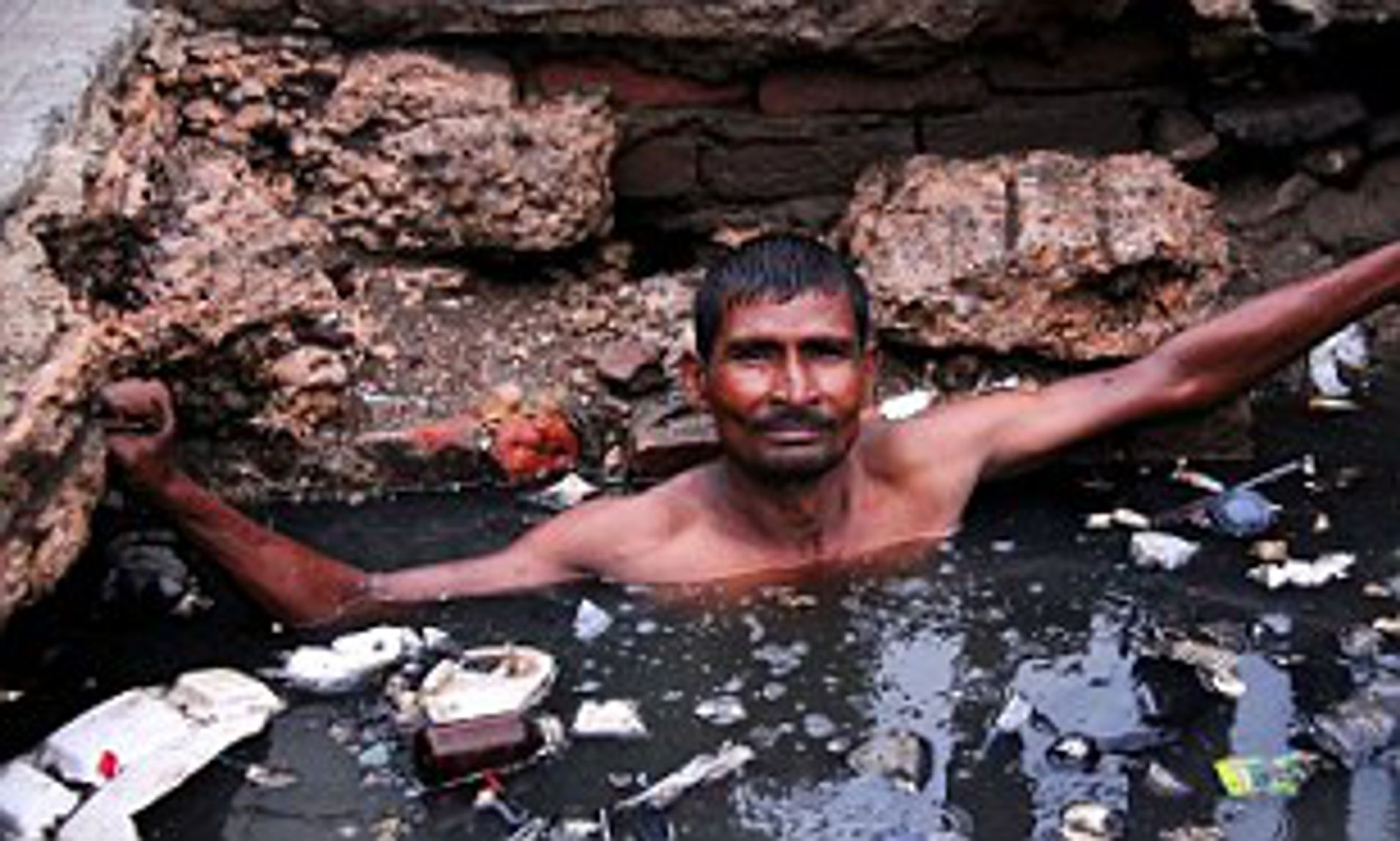 And you thought you had a bad job: Indian 'sewer diver' paid just £3.50 a  day (plus a bottle of booze) to unclog Delhi's drains | Daily Mail Online