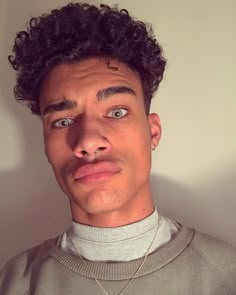 1d2c08060c981430404438e767c3bb30--black-men-hairstyles-curly-hairstyles.jpg
