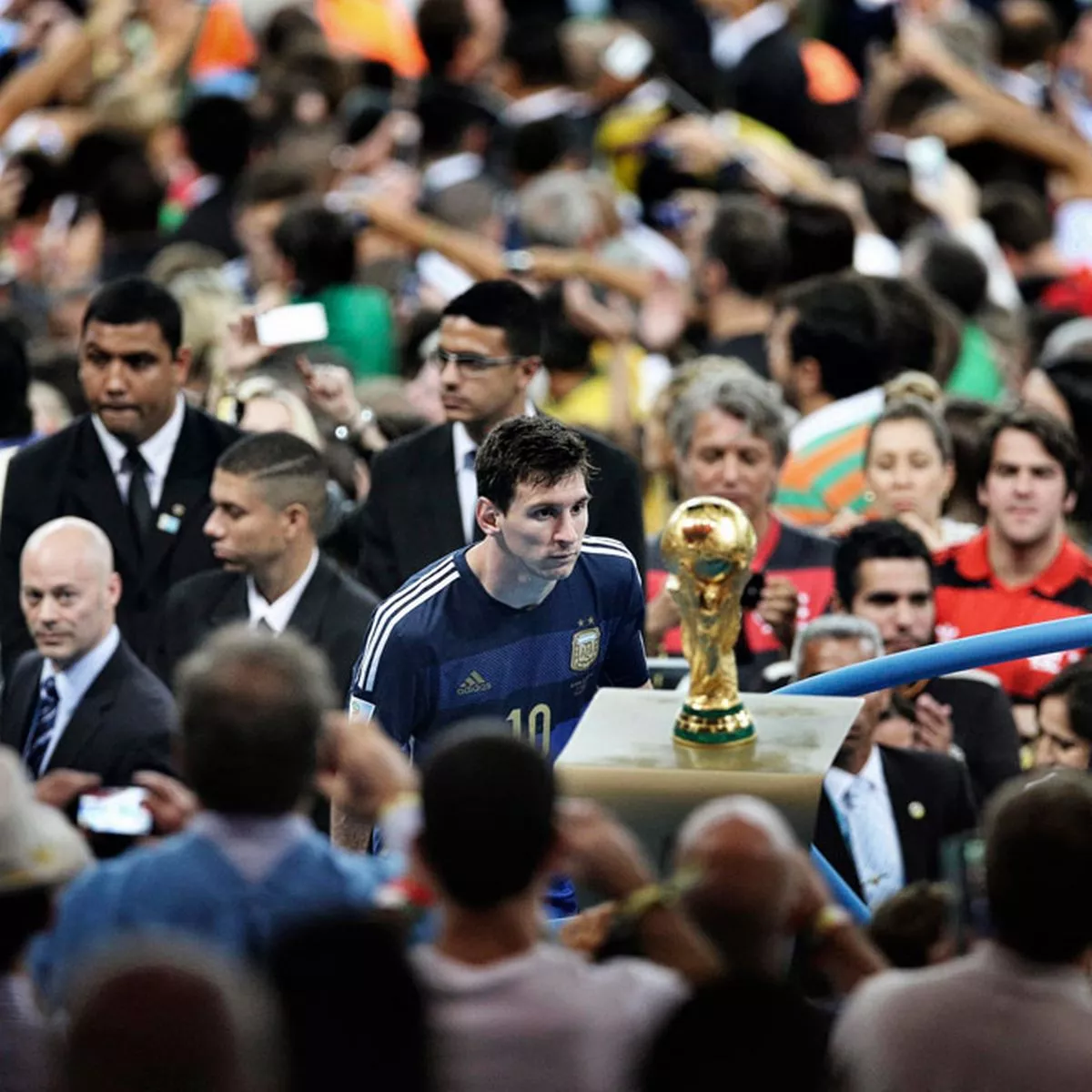 Iconic image of Lionel Messi staring at the World Cup voted best sports  picture of 2014 - Mirror Online