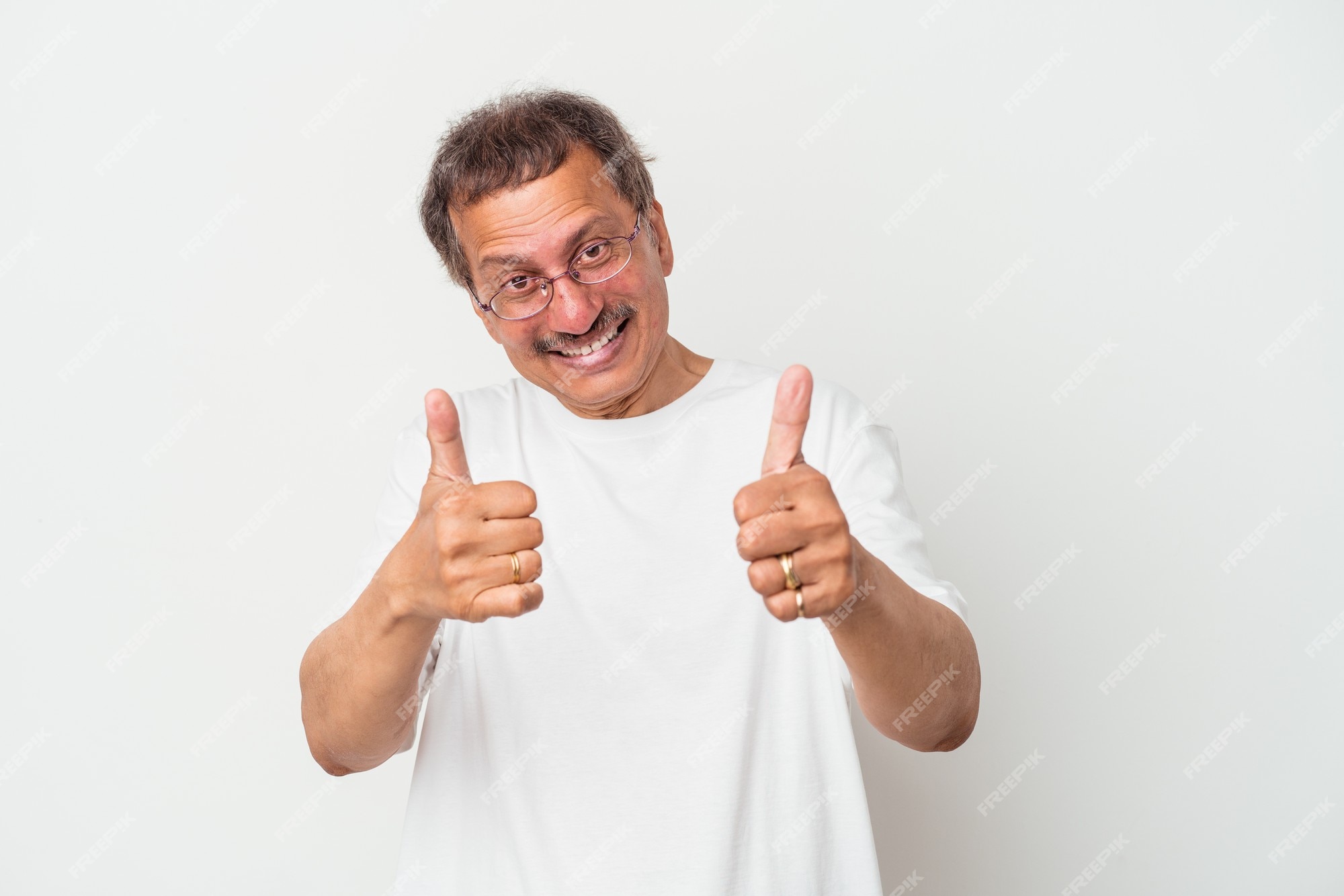 middle-aged-indian-man-isolated-raising-both-thumbs-up-smiling-confident_1187-163251.jpg