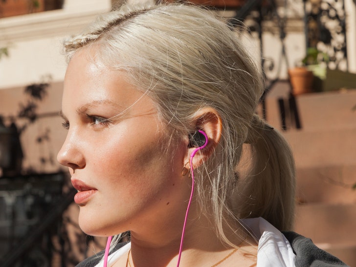 woman-with-ponytail-and-headphones.jpg