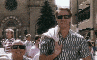 arnold schwarzenegger laughing GIF arnold schwarzenegger laughing GIF