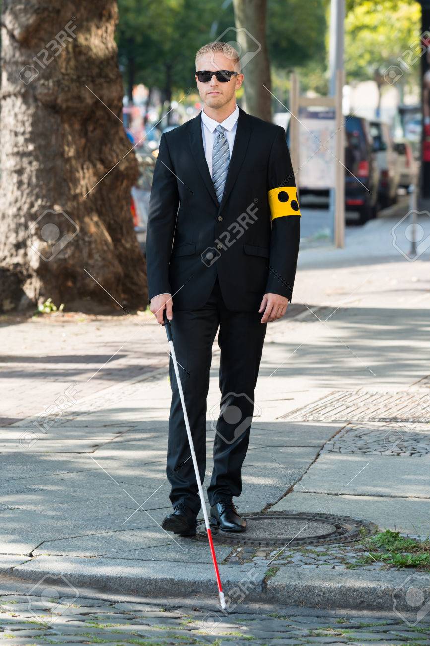 https://previews.123rf.com/images/andreypopov/andreypopov1511/andreypopov151100738/48226824-blind-man-walking-on-sidewalk-h%C3%A4lt-stick-tragen-armband.jpg