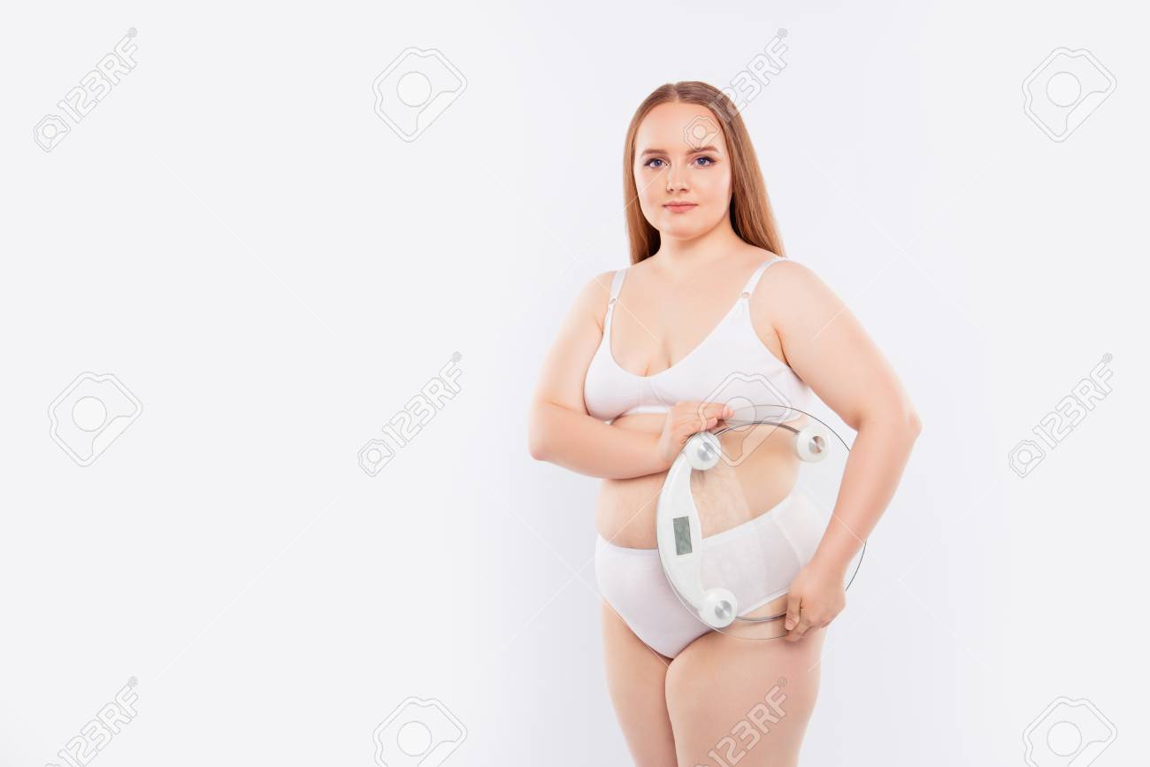 98013672-portrait-of-over-size-plus-size-chubby-confident-cute-positive-lovely-young-woman-wearing-white.jpg