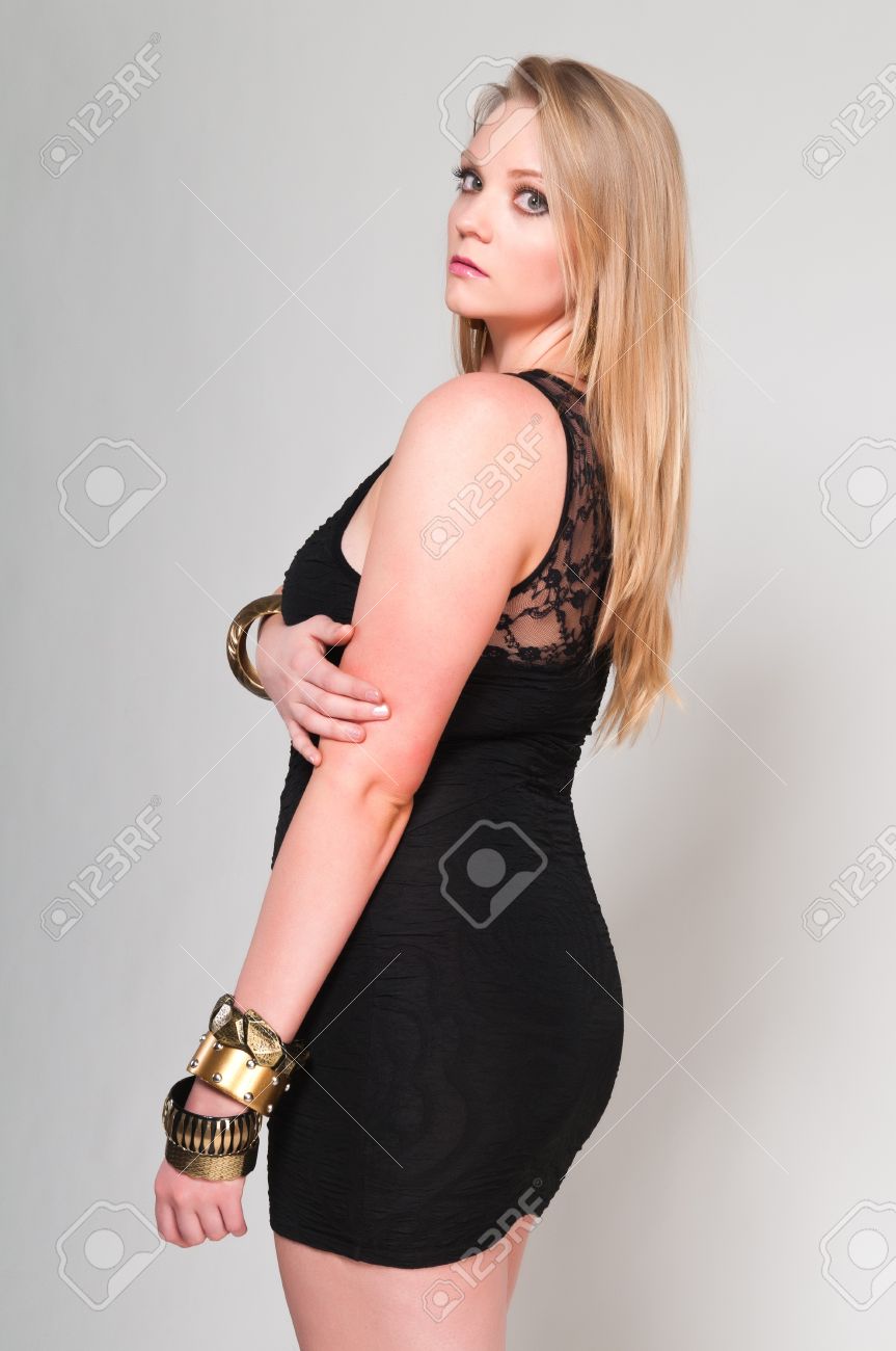 13162594-pretty-young-plus-size-blonde-in-a-black-dress.jpg