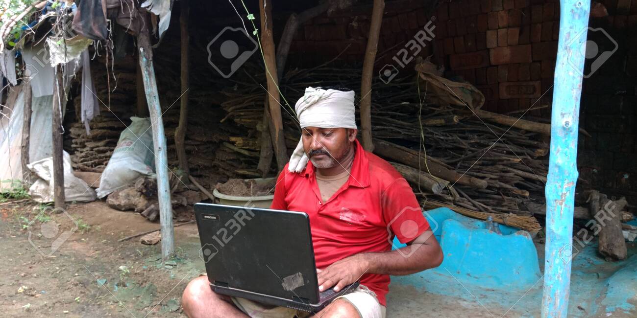 153546498-district-katni-india-august-14-2019-an-indian-village-man-learning-laptop-computer-technology-at.jpg