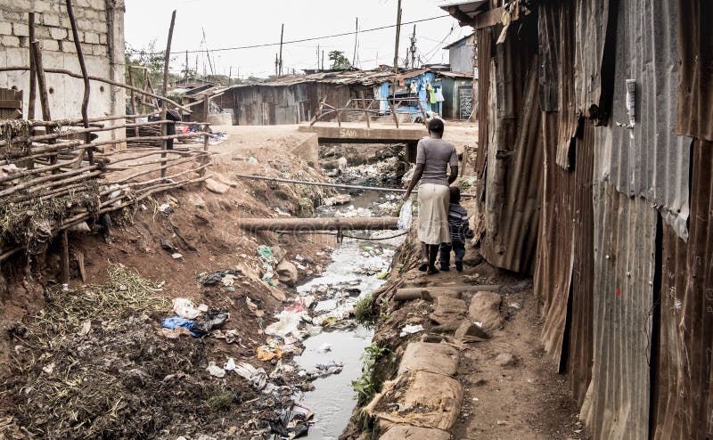 people-walking-along-open-sewer-slum-africa-east-87480333.jpg