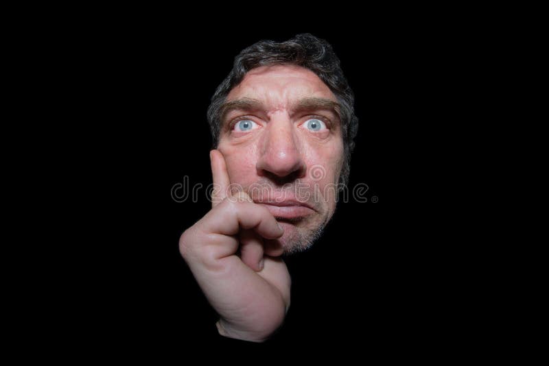 ugly-thoughtful-man-big-blue-eyes-hand-chin-isolated-black-background-63545312.jpg