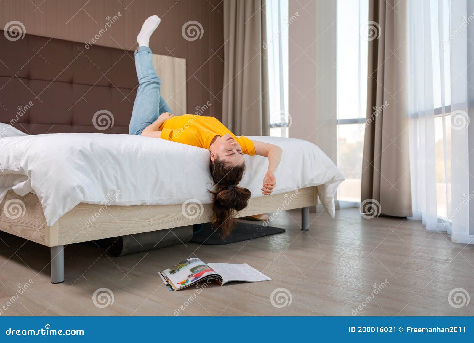 boredom-quarantine-woman-lying-bed-her-head-hands-hanging-over-edge-there-s-magazine-floor-boredom-200016021.jpg