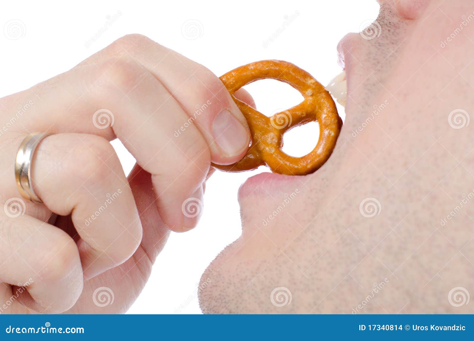 man-eating-pretzel-17340814.jpg