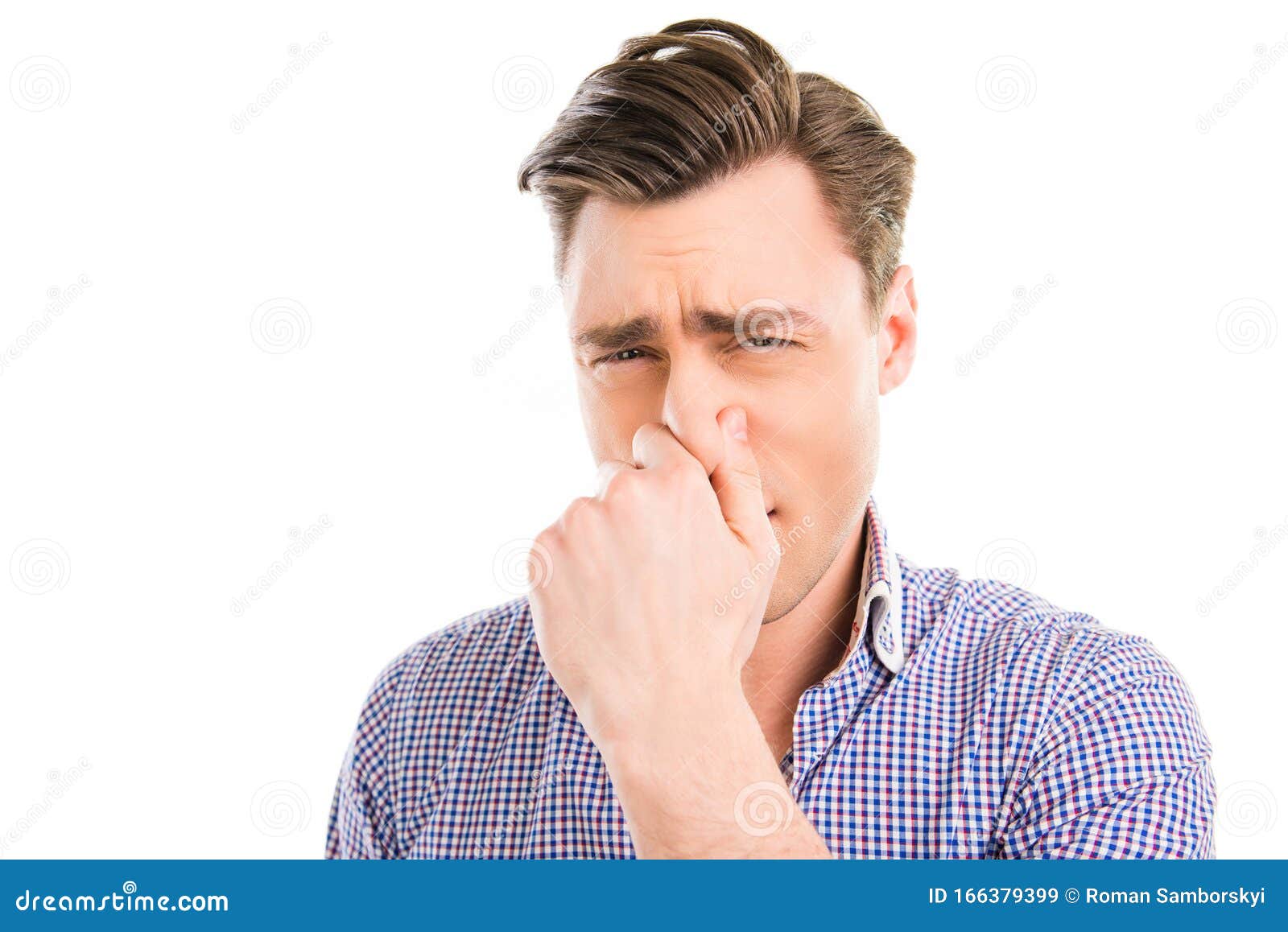portrait-handsome-man-closed-nose-stink-smell-portrait-handsome-man-closed-nose-stink-smell-166379399.jpg