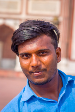 88820620-amber-india-september-19-2017-portrait-of-an-unidentified-indian-man-wearing-a-blue-t-shirt-on-the.jpg